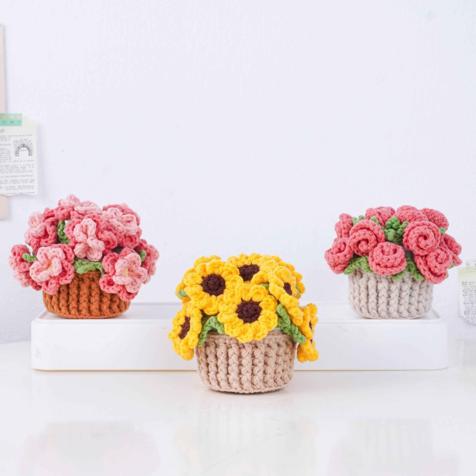 Aesthetic floral crochet coasters beside coffee mug